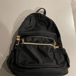 Black Backpack with Gold Accents